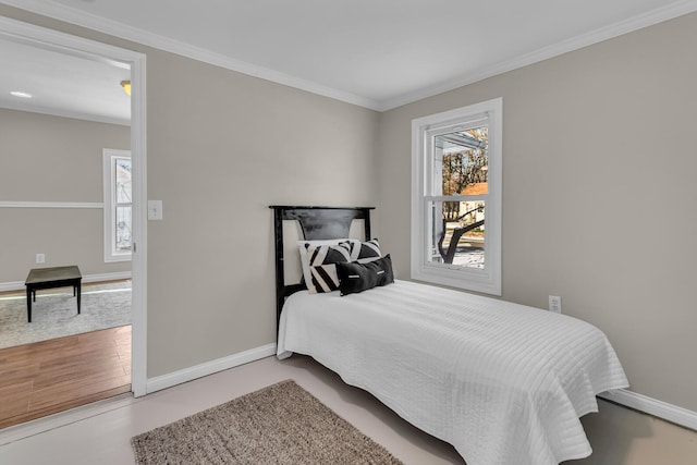 bedroom with hardwood / wood-style floors and crown molding