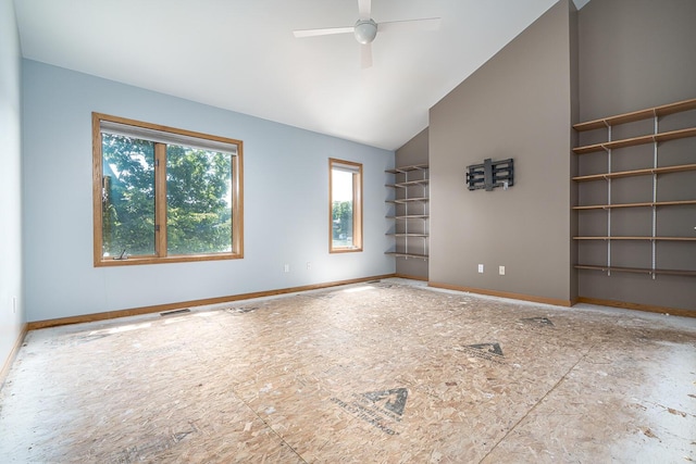 unfurnished room featuring high vaulted ceiling and ceiling fan