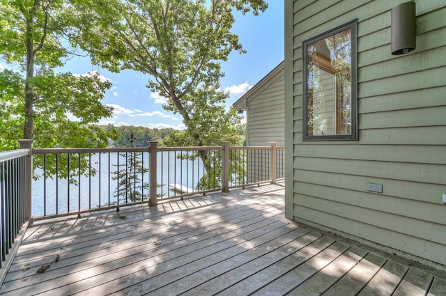 wooden deck with a water view