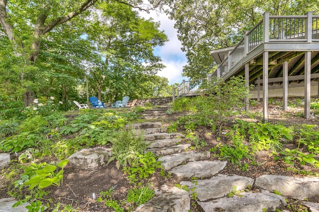 view of yard with a wooden deck