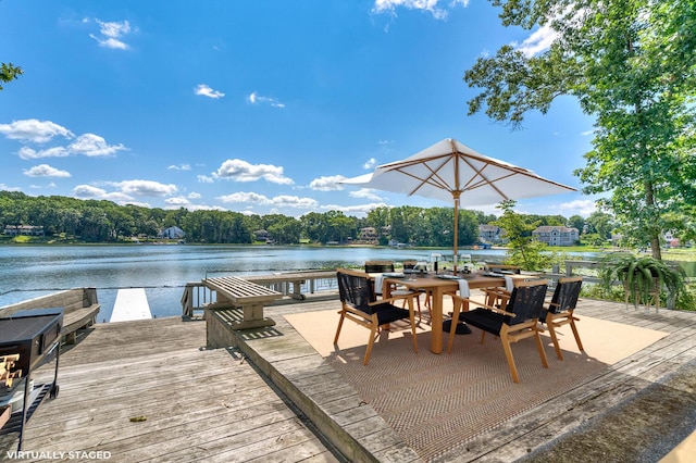 view of dock with a water view