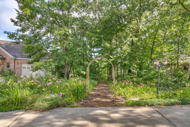 view of yard featuring a garage