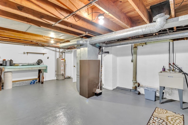 basement featuring heating unit and water heater