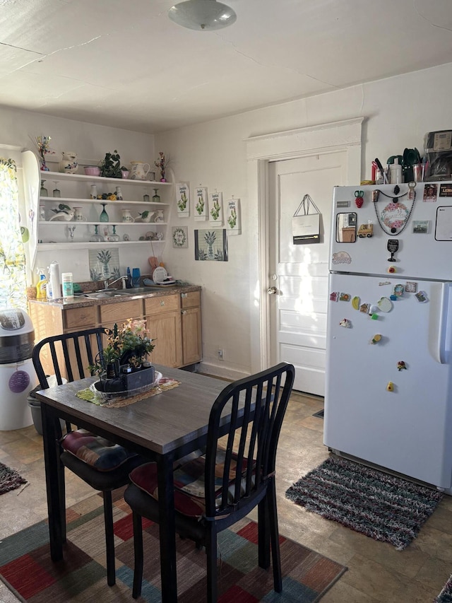 dining space with sink