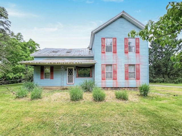 view of front of house featuring a front lawn