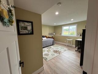 bedroom featuring light hardwood / wood-style flooring