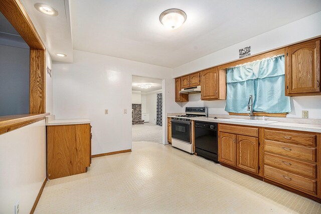 kitchen featuring black dishwasher, white gas range, and sink