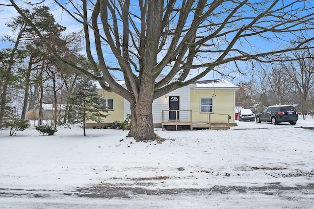 view of snow covered property