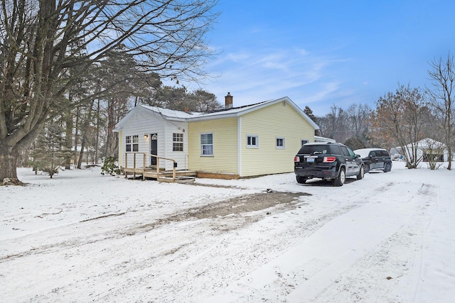 view of snow covered property