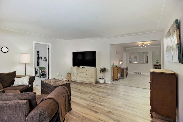 living room with light hardwood / wood-style floors