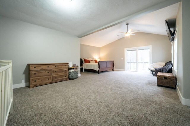 bedroom featuring a textured ceiling, ceiling fan, carpet, and vaulted ceiling