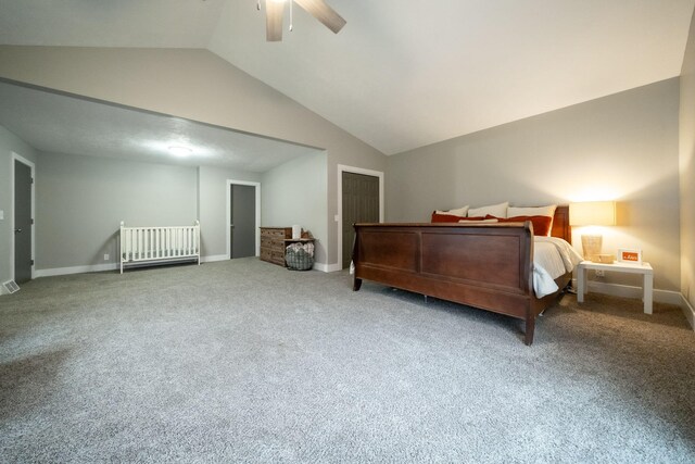 carpeted bedroom with ceiling fan and lofted ceiling