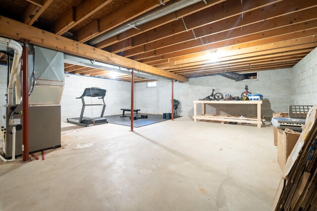 basement featuring heating unit