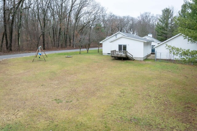 view of yard with a wooden deck