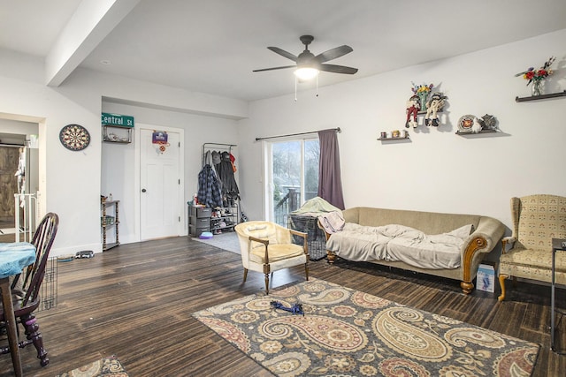 living room featuring beam ceiling, ceiling fan, and dark hardwood / wood-style flooring