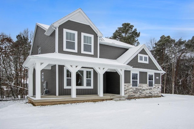 view of front of property featuring covered porch