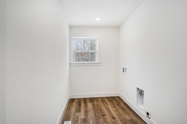 laundry area with dark hardwood / wood-style flooring and washer hookup