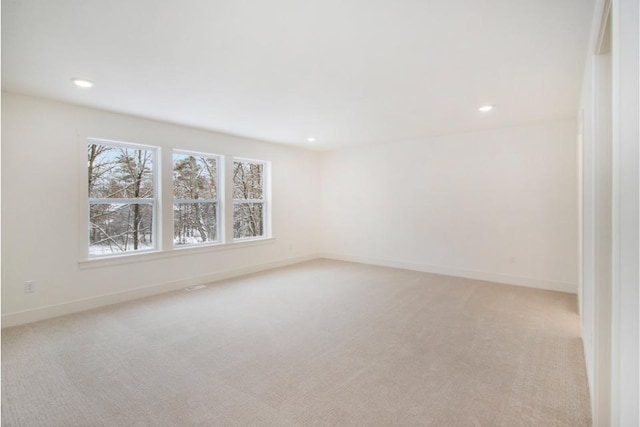 view of carpeted spare room