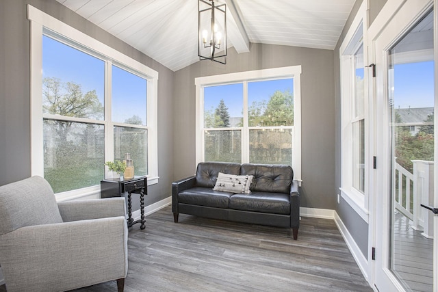 sunroom / solarium featuring a chandelier, vaulted ceiling with beams, and wooden ceiling