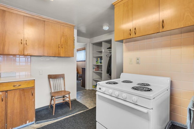 kitchen featuring white electric stove