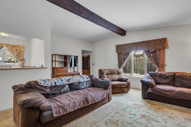 living room with light carpet and vaulted ceiling with beams