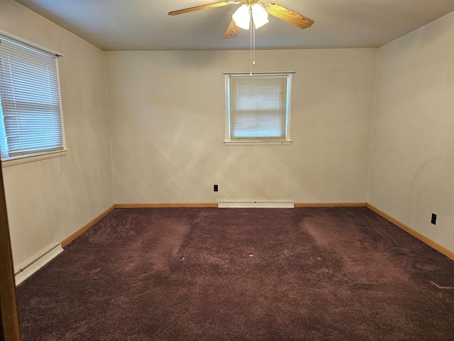 empty room with carpet flooring, ceiling fan, and a baseboard heating unit