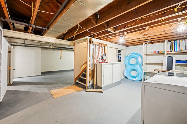 basement with washer and dryer