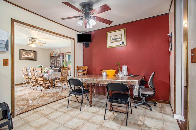 dining room with ceiling fan and light tile patterned flooring