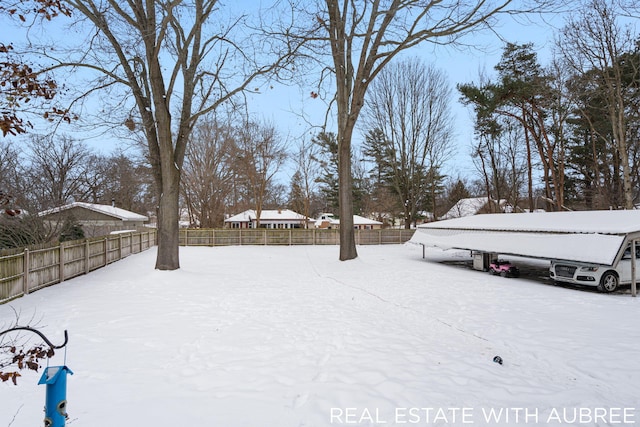 view of yard covered in snow