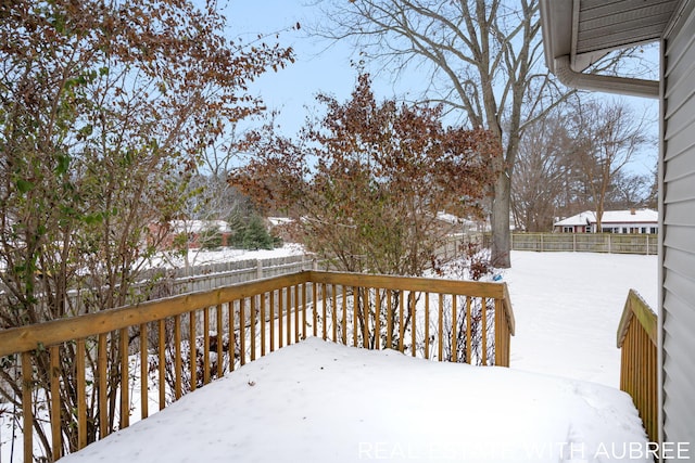 view of snow covered deck