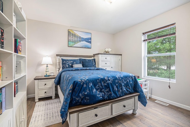 bedroom featuring light hardwood / wood-style floors