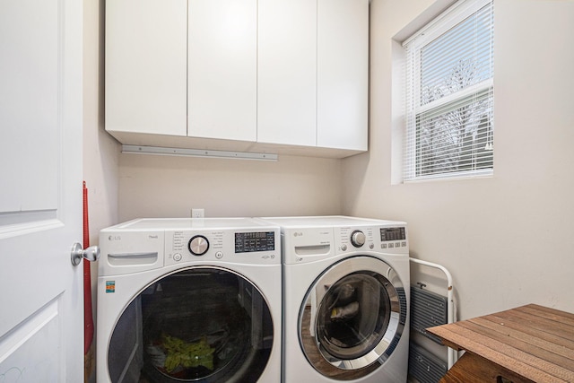 laundry room featuring washing machine and clothes dryer