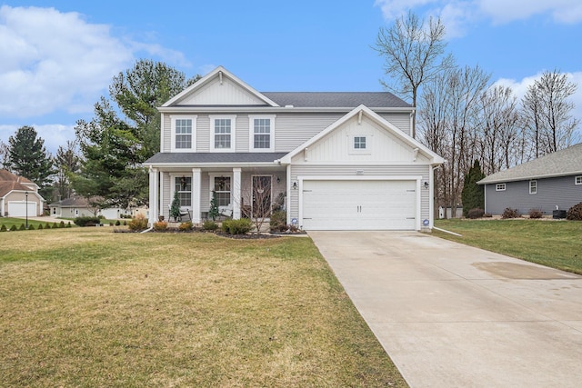 view of front of home featuring a front lawn and a garage