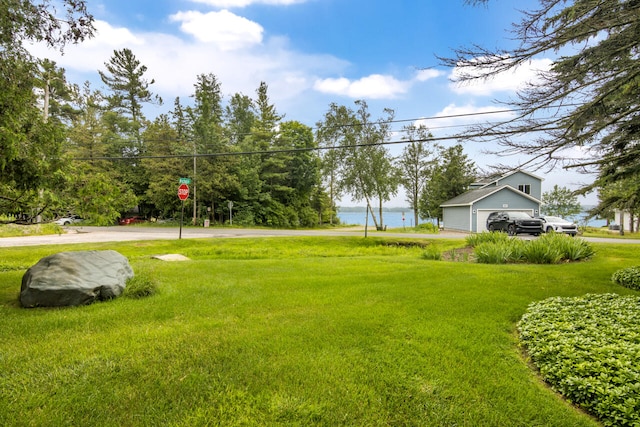 view of yard with a water view