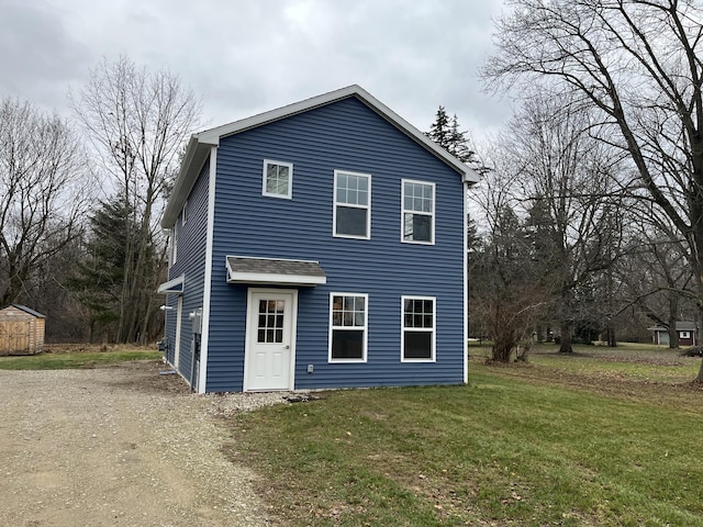 view of front of home with a front yard