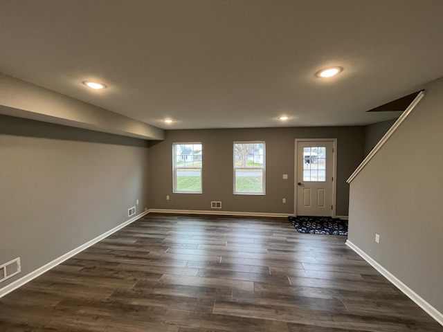 entrance foyer featuring dark hardwood / wood-style flooring