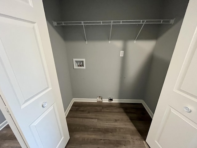 laundry area featuring washer hookup and dark hardwood / wood-style flooring