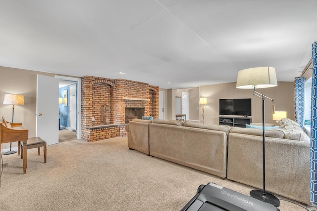 carpeted living area featuring a fireplace