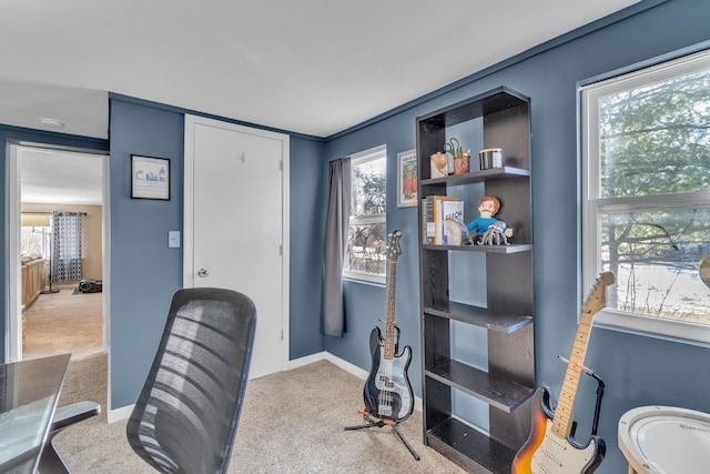 office area with carpet flooring and baseboards