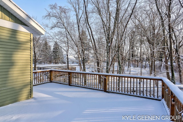 view of snow covered deck