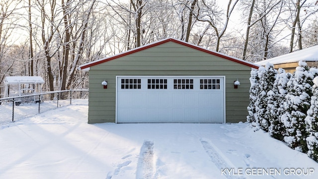 view of snow covered garage