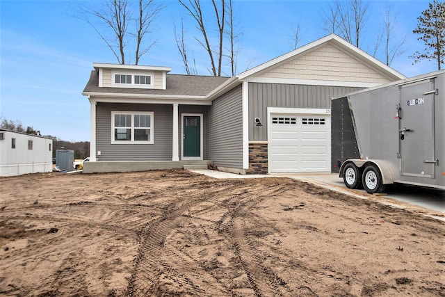 view of front of property with a garage