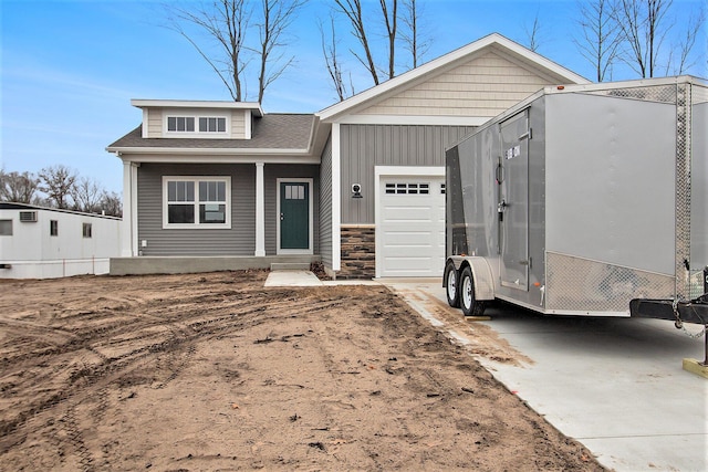 view of front of property with a garage