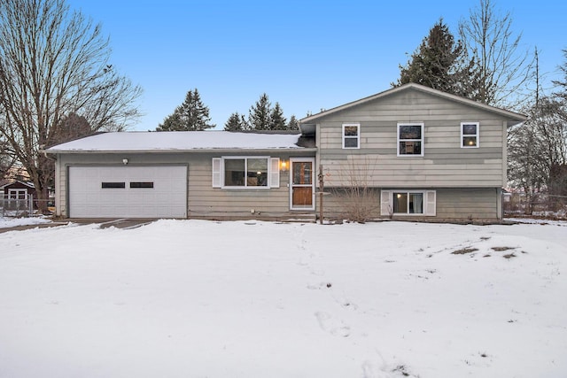 tri-level home featuring a garage