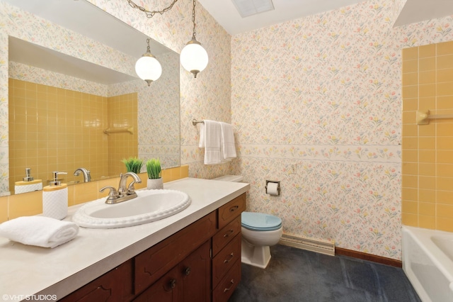 884 Oakridge Dr, Saint Joseph, MI 49085 - bathroom with toilet, visible vents, vanity, and a baseboard radiator