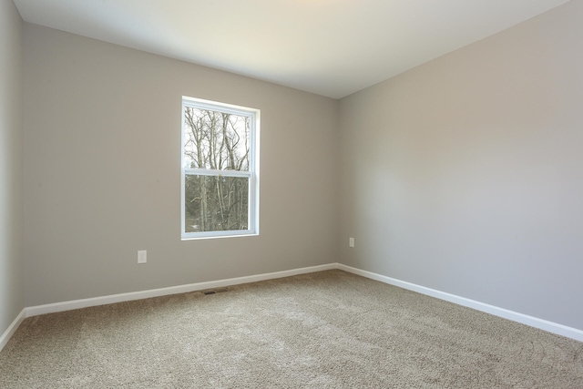 view of carpeted spare room