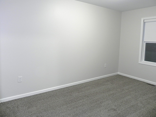 empty room featuring carpet