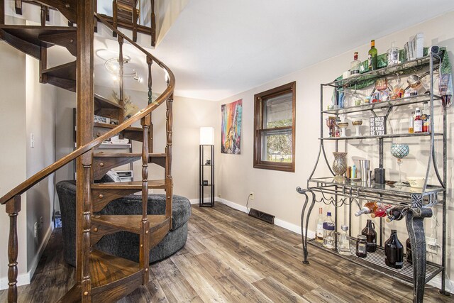 stairway with wood-type flooring