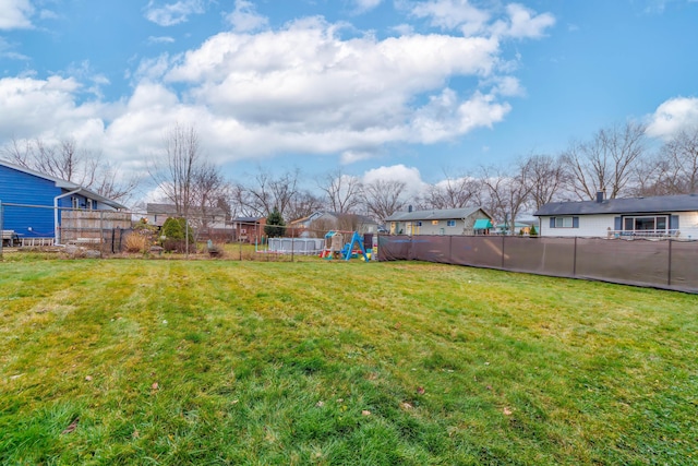 view of yard with a playground