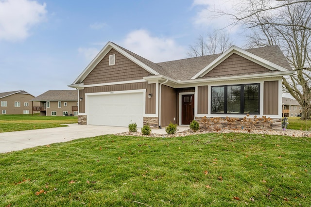 craftsman inspired home featuring a front lawn and a garage